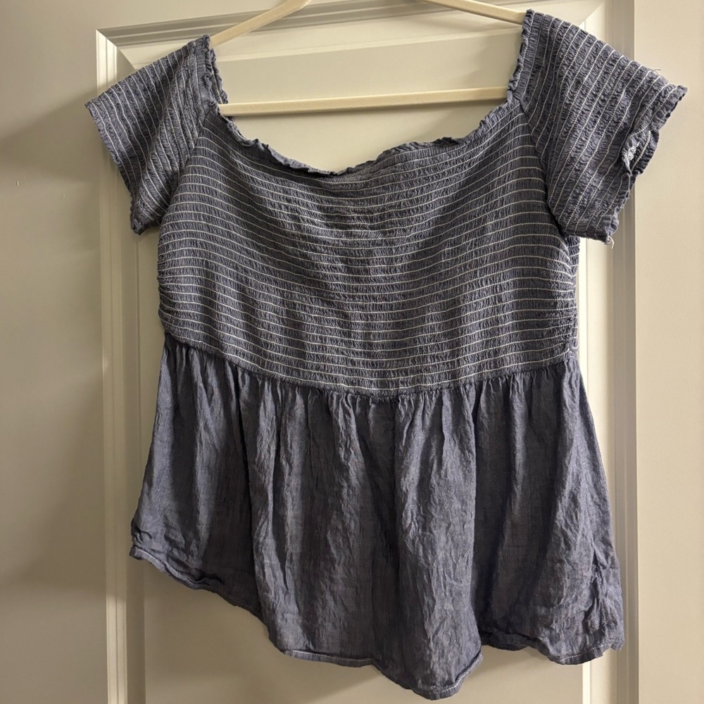 Off the shoulder or wide neck shirt